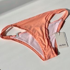 NWT coral orange rhythm silky cut out sides itsy bikini skimpy bottoms melon L